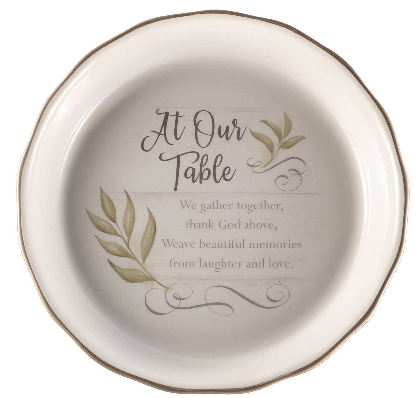Decorative plate with engraved text and leaf designs on a white background