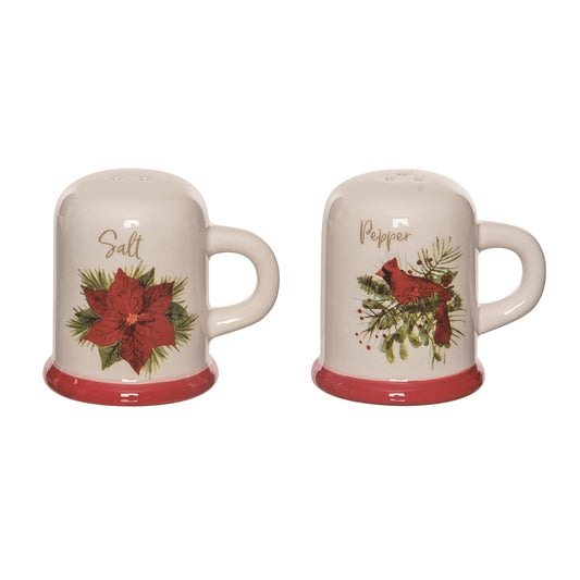 Set of Christmas-themed salt and pepper shakers on a white background