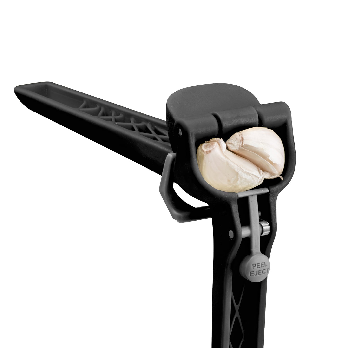 Black garlic peeler with two cloves of garlic inside on a white background