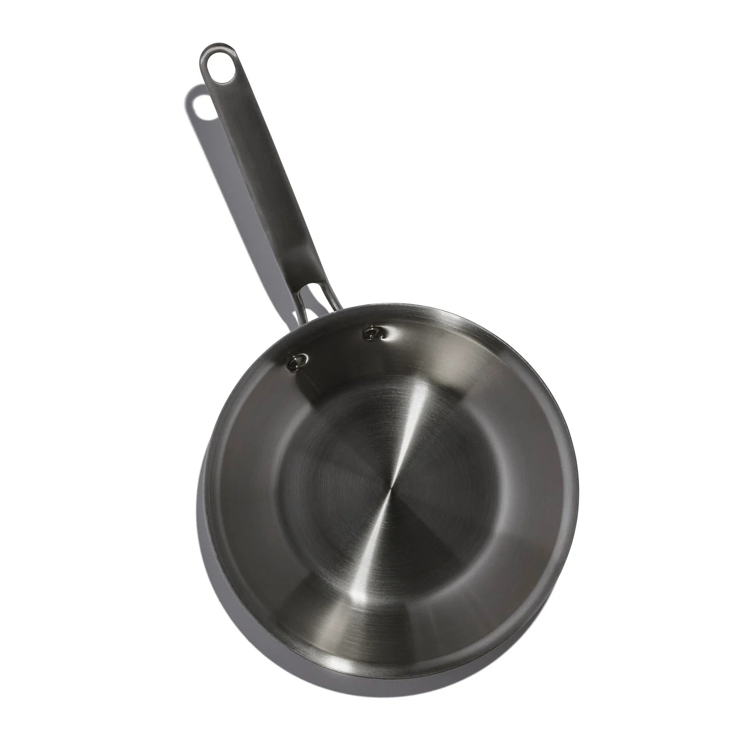Stainless steel frying pan with black handle on a white background
