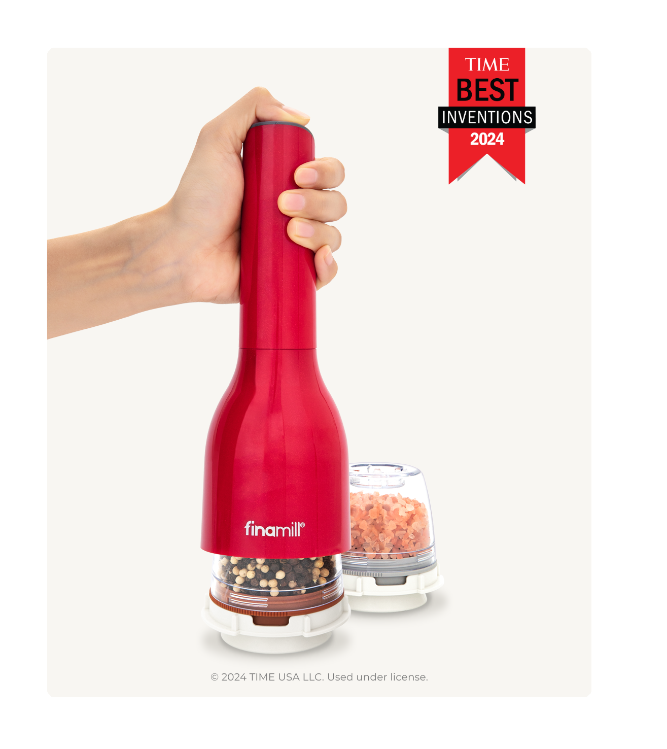 Red pepper grinder with TIME Best Inventions 2024 award on a white background