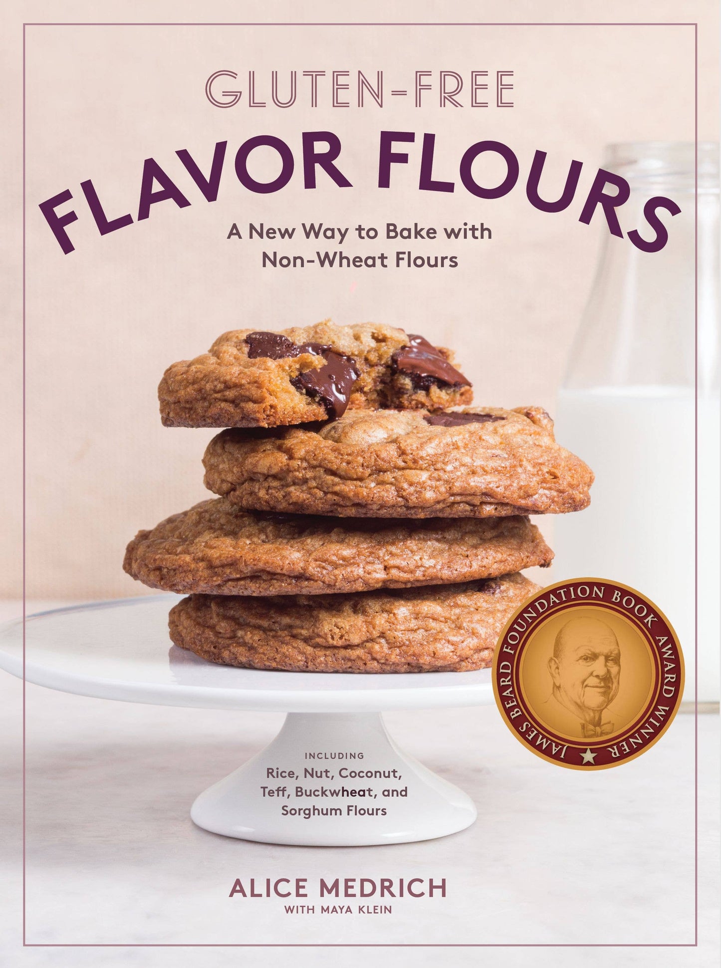 Book cover of 'Flavor Flours' by Alice Medrich with a stack of cookies and a glass of milk.