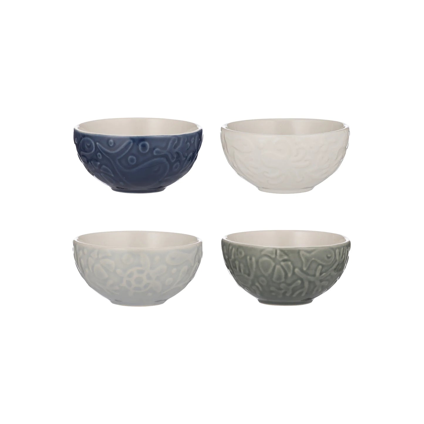 Four ceramic bowls in different colors on a white background