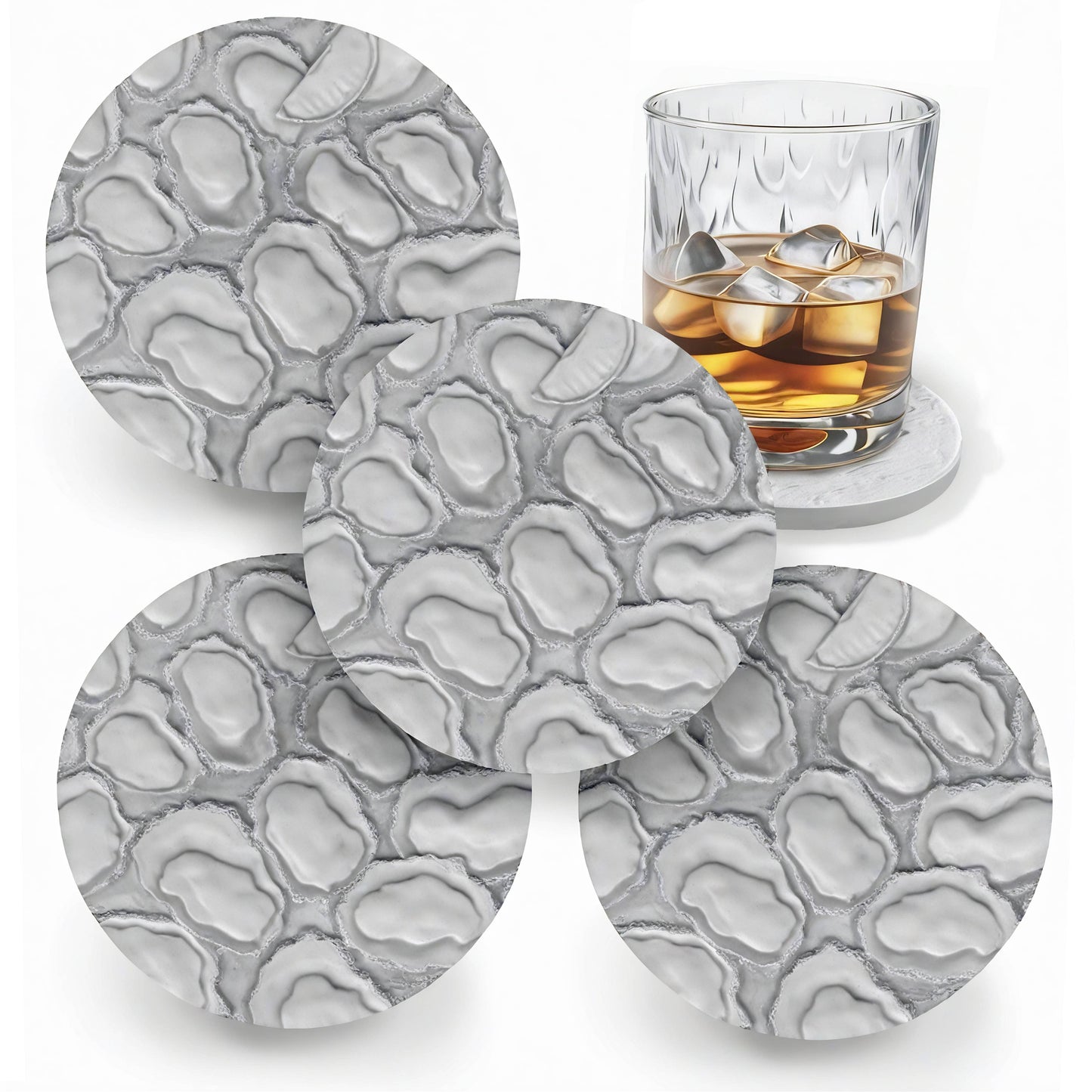 Set of four gray stone-textured coasters with a glass of whiskey on a white background