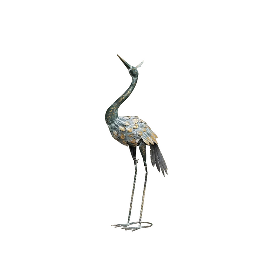 Decorative metal crane sculpture on a white background