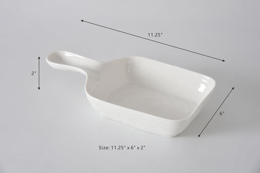 White ceramic casserole dish with dimensions labeled on a gray background