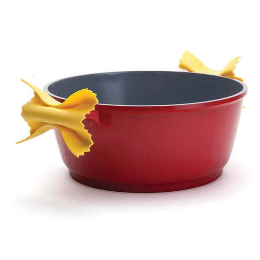 Red bowl with yellow pasta grips on a white background