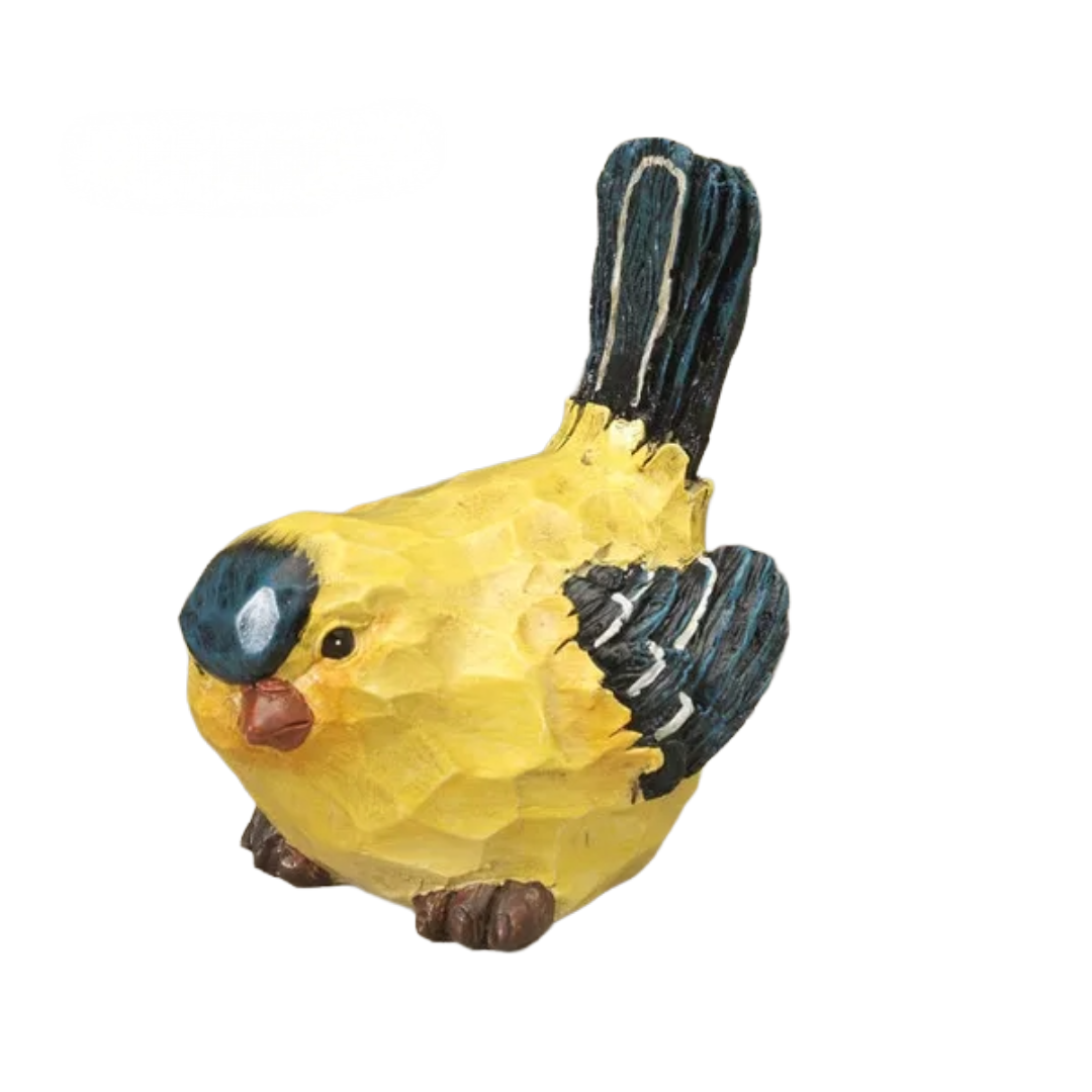 Yellow bird figurine with black and brown details on a white background