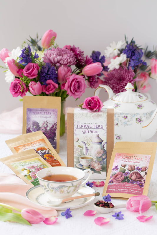 Tea packaging with a teacup, flowers, and a teapot on a white background
