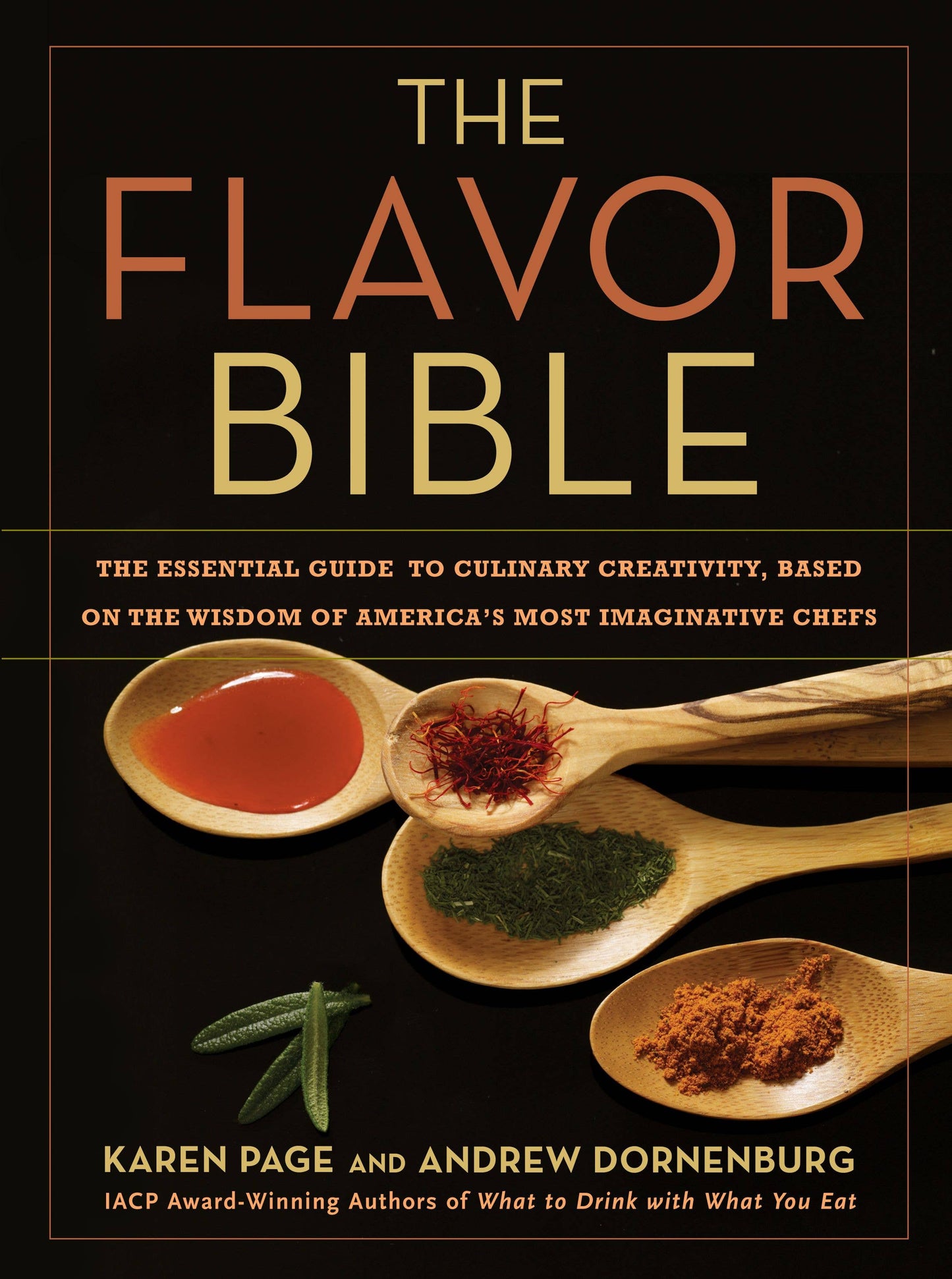 Book cover of 'The Flavor Bible' with wooden spoons holding spices and herbs.
