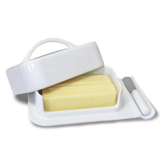 White butter dish with a lid and knife on a white background