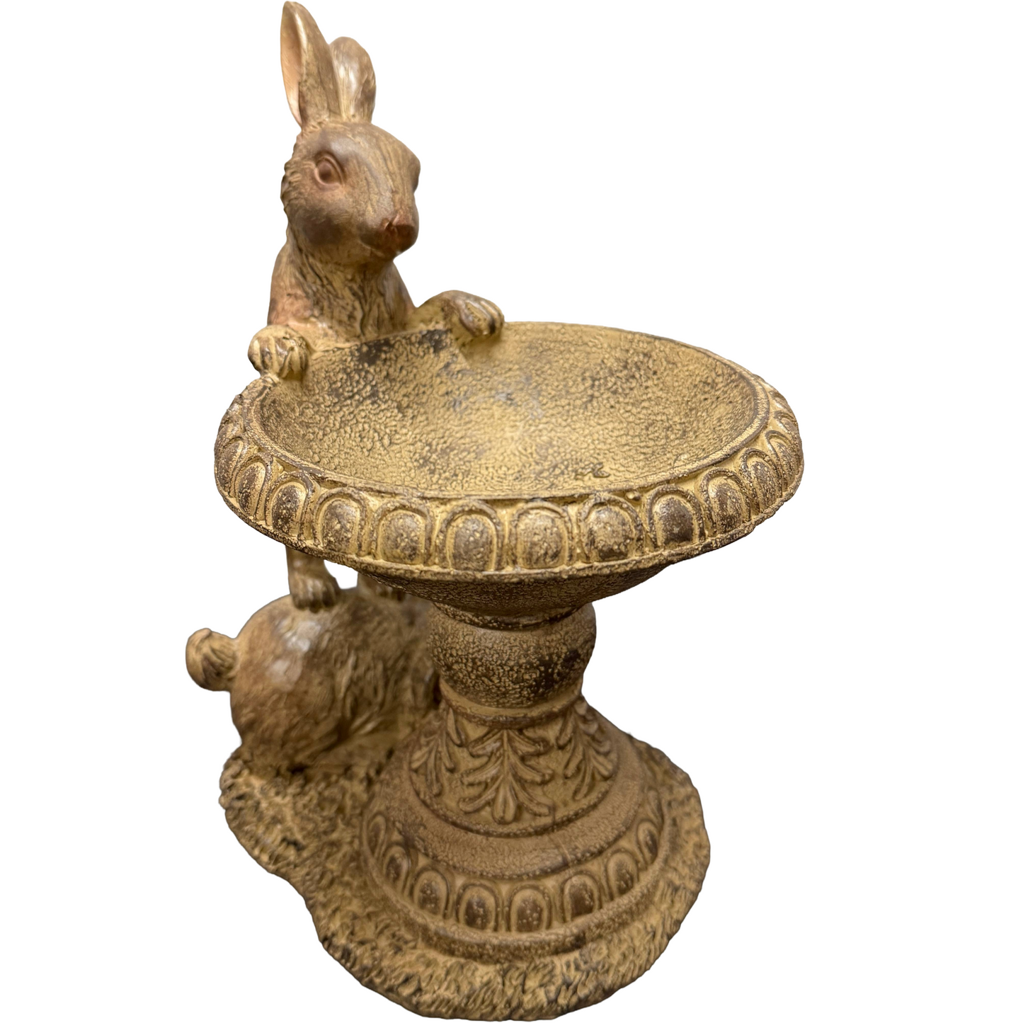 A bunny standing on the back of another bunny and looking into a bowl.