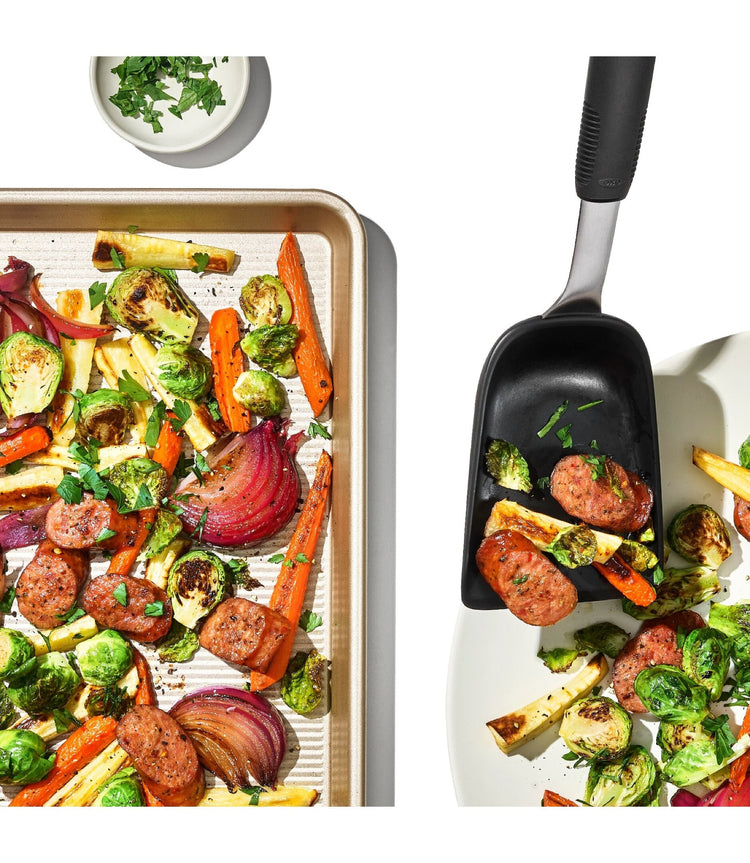 OXO Nonstick Ceramic Baking Pan with Veggies and OXO sheet pan scoop