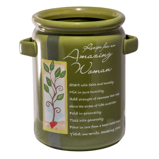 Green ceramic utensil  jar with text and design on a white background