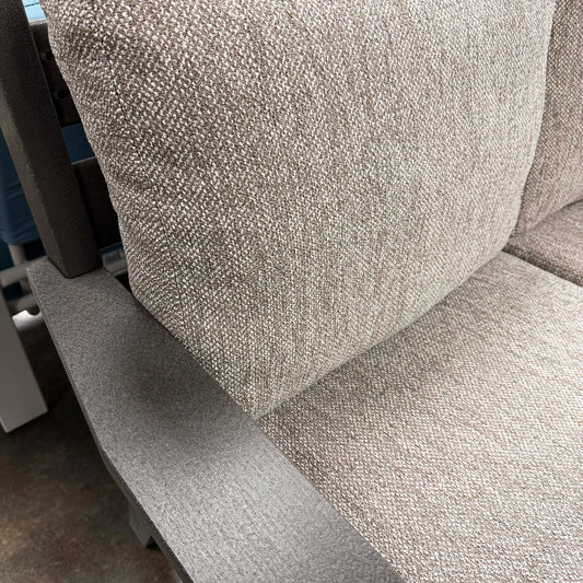 Close-up of a textured gray fabric surface