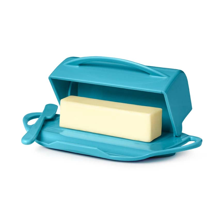 Blue butter dish with a stick of butter on a white background