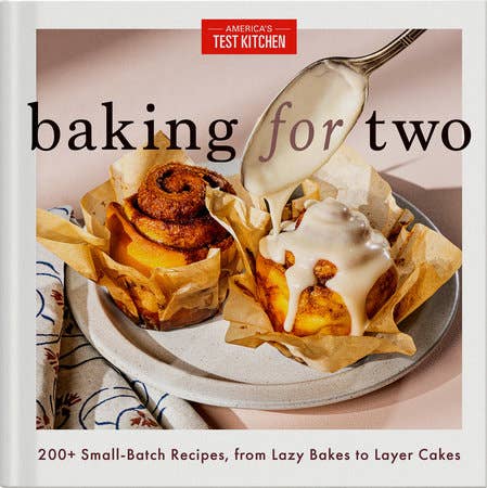 Book cover of 'Baking for Two' with a plate of baked goods and a spoon.