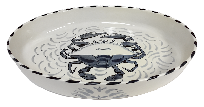 White ceramic casserole dish with bluecrab design on a white background