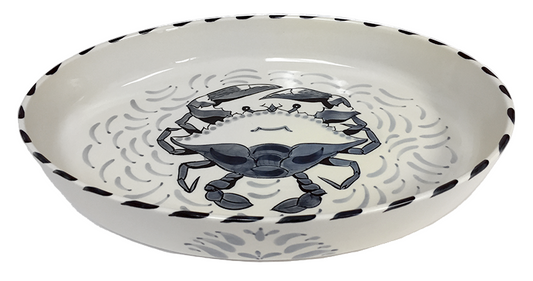 White ceramic casserole dish with bluecrab design on a white background