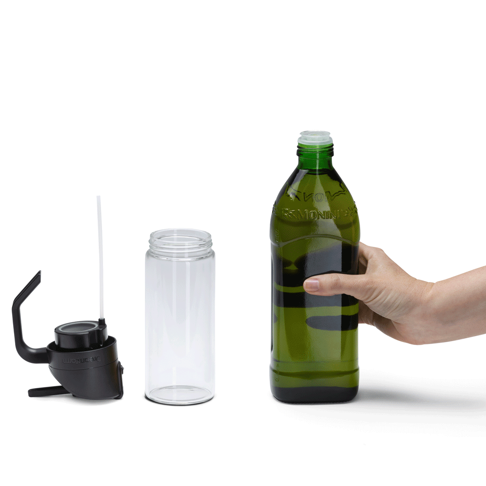 Adding oil to the Oileroo bottle