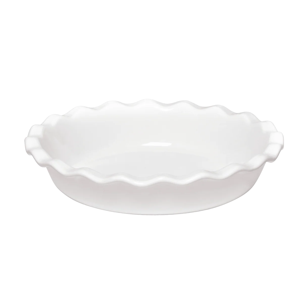 White ceramic pie dish with scalloped edge on a white background