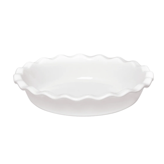 White ceramic pie dish with scalloped edge on a white background