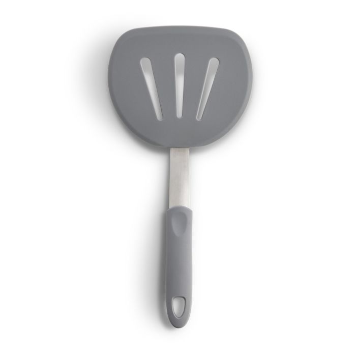 Gray slotted spatula on a white background