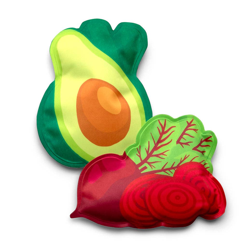Avocado and radish-shaped ice packs on a white background