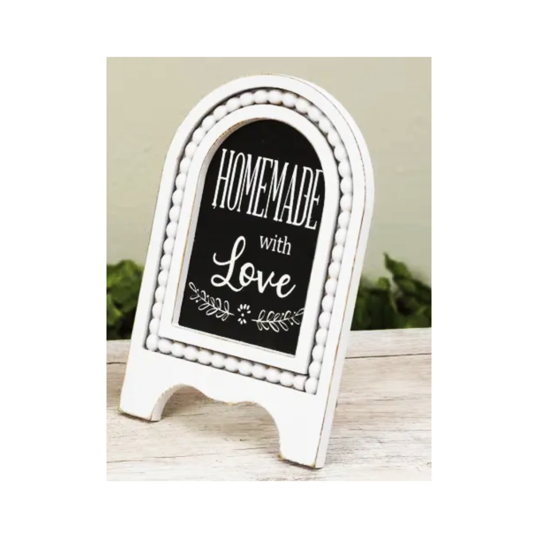 Small easel sign with 'Homemade with Love' text on a white background