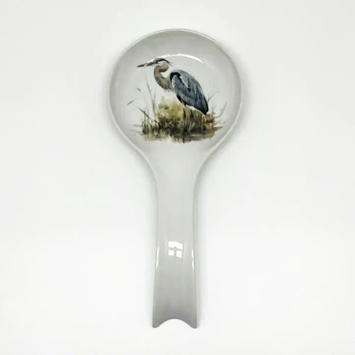 Spoon rest with a heron design on a white background