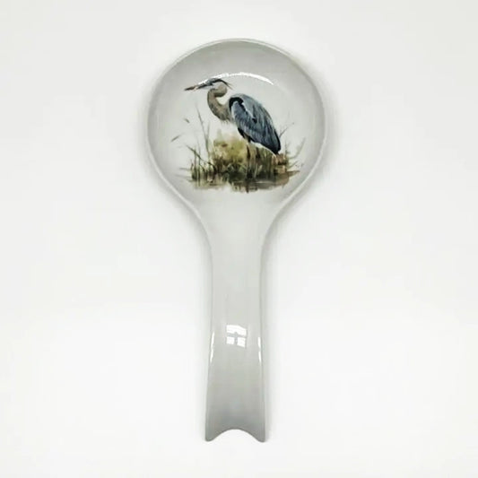 Spoon rest with a heron design on a white background