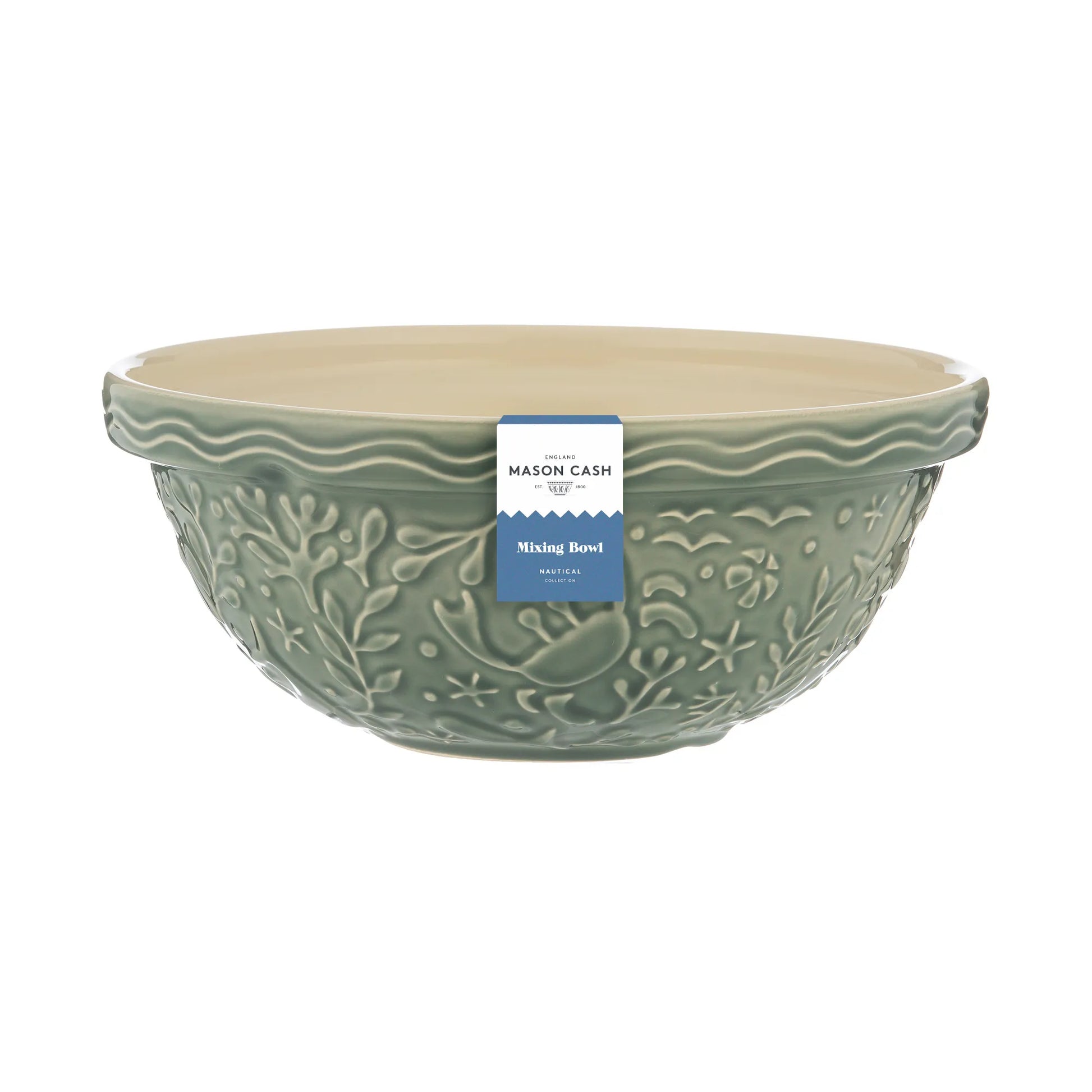 Green mixing bowl with a label on a white background