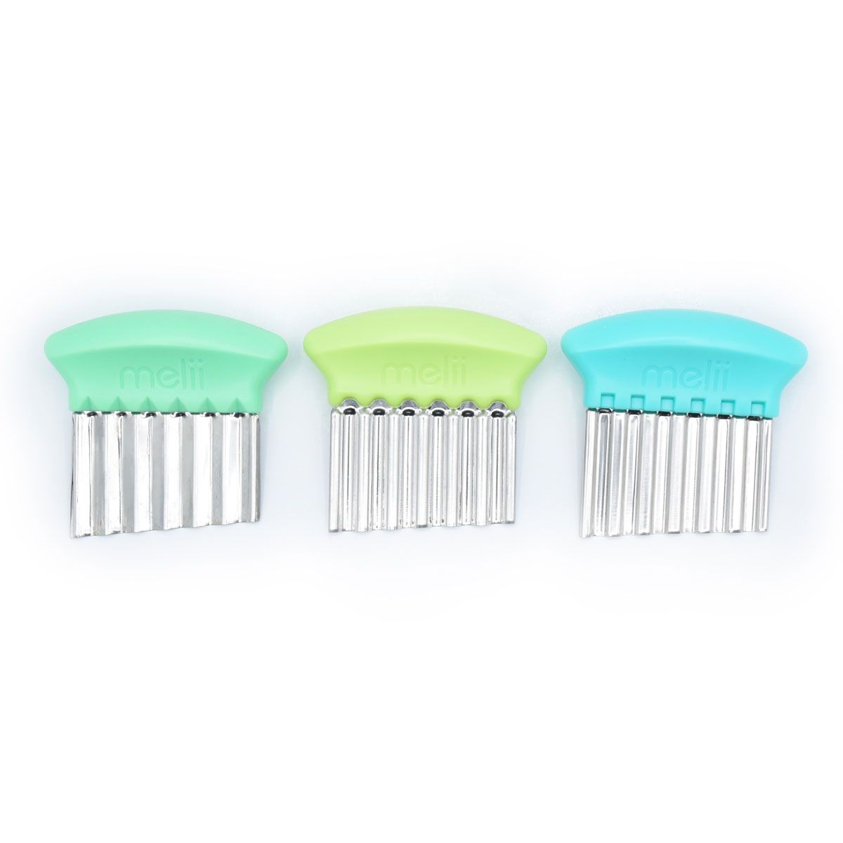 Three vegetable and fruit slicers with green and blue handles on a white background