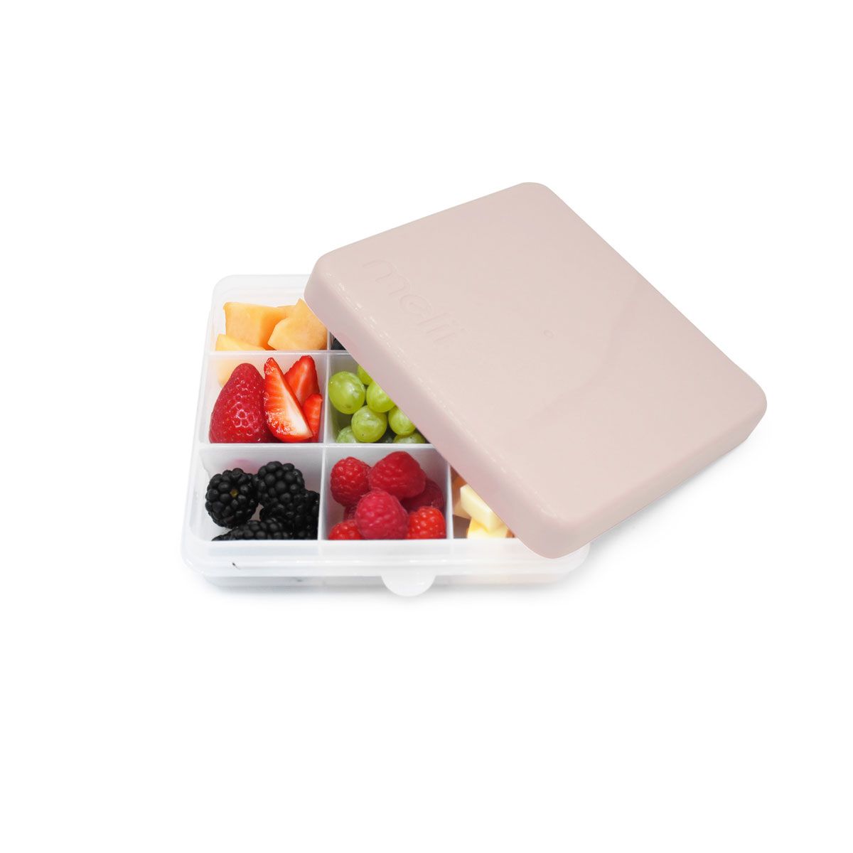 Fruit compartment with compartments filled with various fruits including strawberries, grapes, blackberries, and raspberries on a white background.