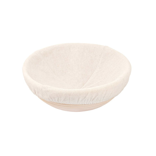 Round white proofing basket on a white background