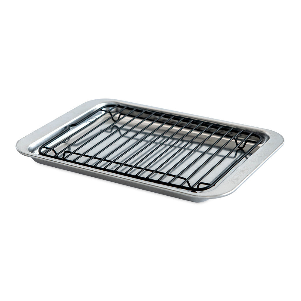 Baking tray with wire rack on a white background