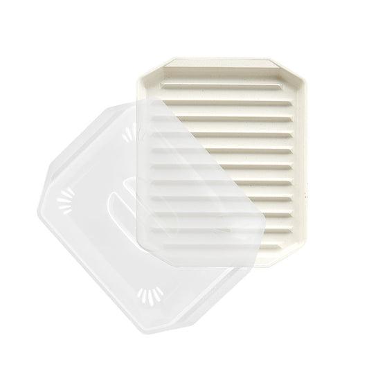 Set of white and beige microwave pans 
on a white background