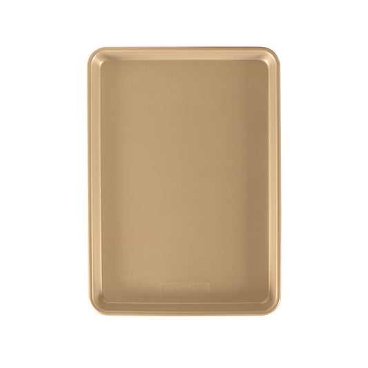 Gold baking tray on a white background