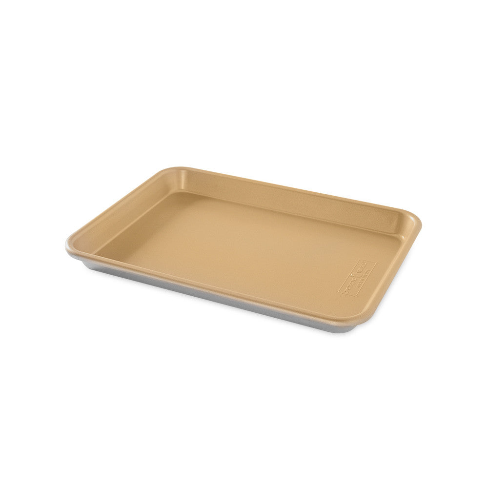 Beige baking tray on a white background