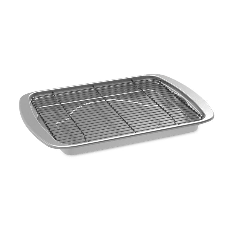 Metal baking tray with wire rack on a white background
