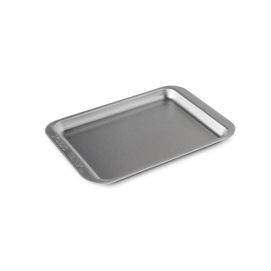 Metal baking tray on a white background
