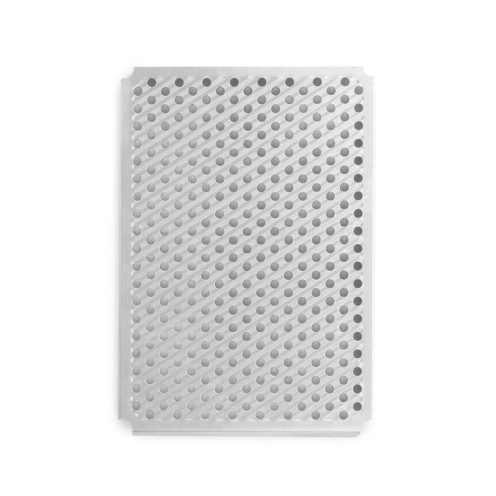Gray perforated cooking sheet on a white background