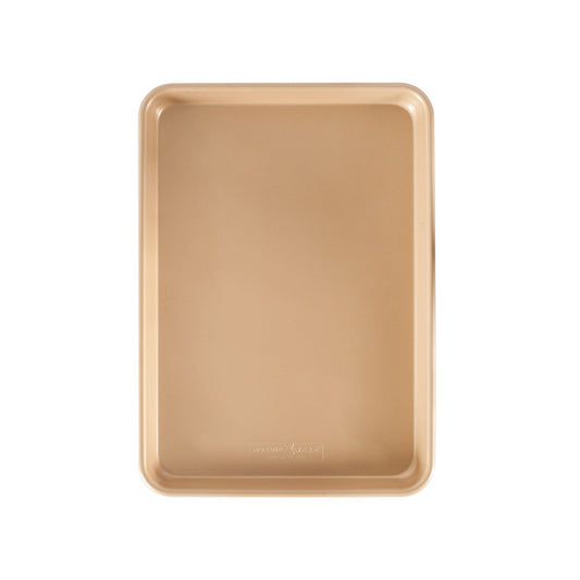 Gold baking tray on a white background