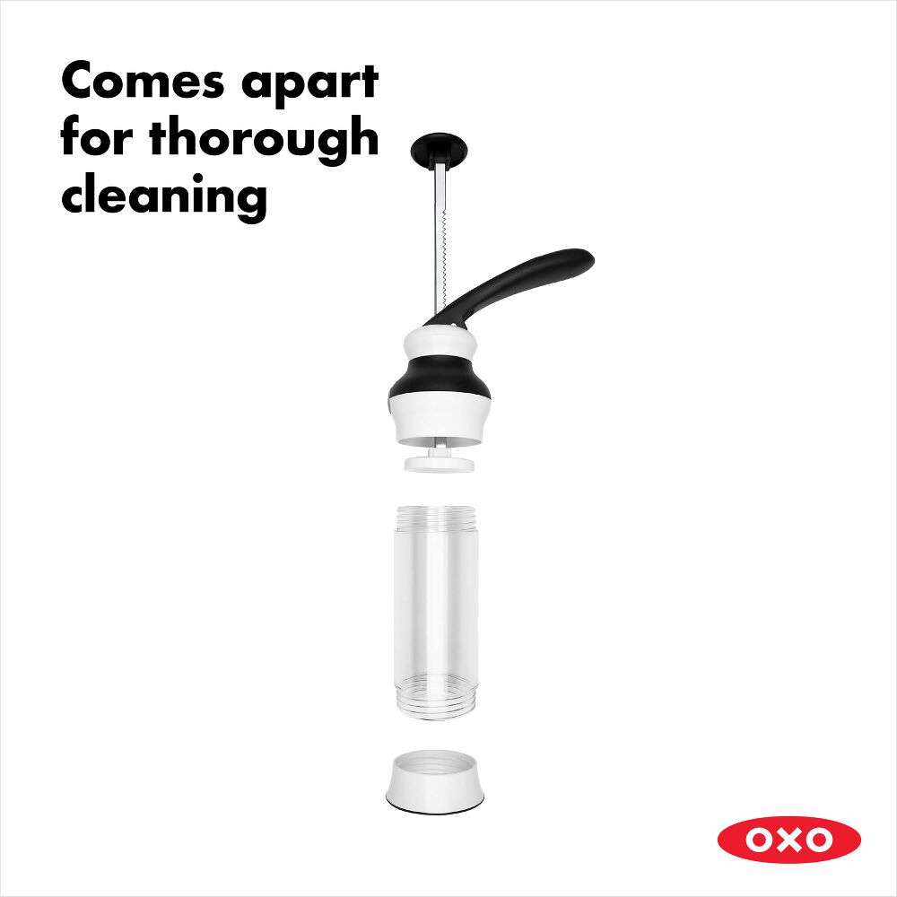 OXO Cookie Press showing detachable parts on a white background