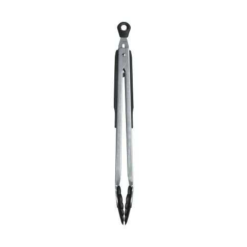 Metal tongs on a white background
