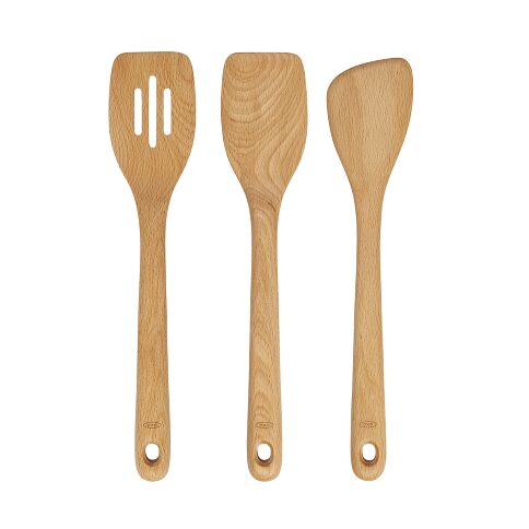 Three wooden spatulas on a white background