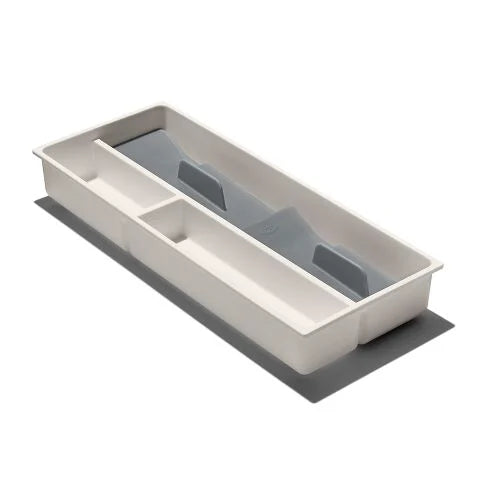 Rectangular plastic tray with utensil 
compartments on a white background