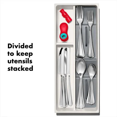Silverware set with divided compartments on a white background
