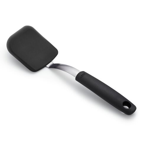 Black spatula with a flexible head on a white background