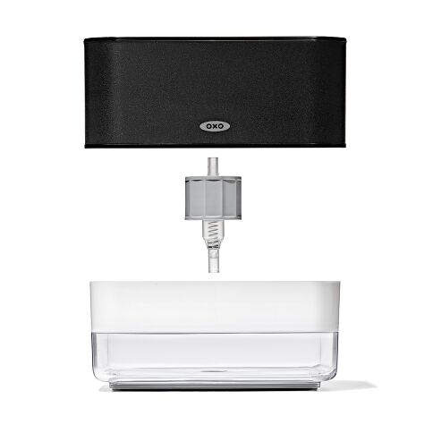 OXO kitchen tool with black lid and clear container on a white background